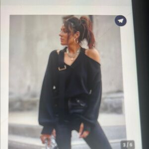 Chic Black Off-Shoulder Sweater with Buckle